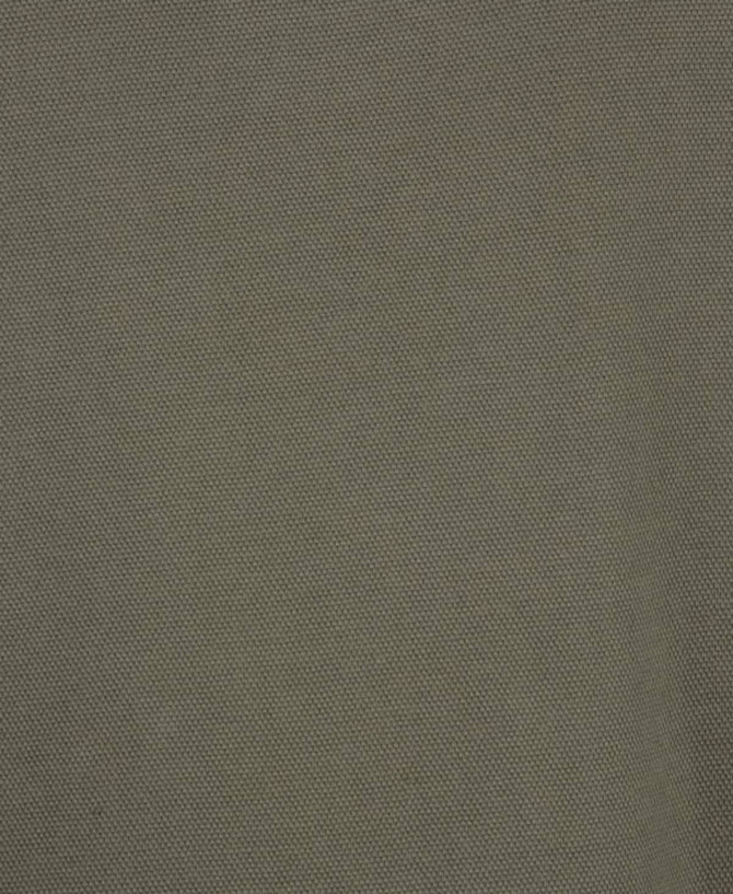 A close-up of a textured, olive-green polo shirt featuring a logo.