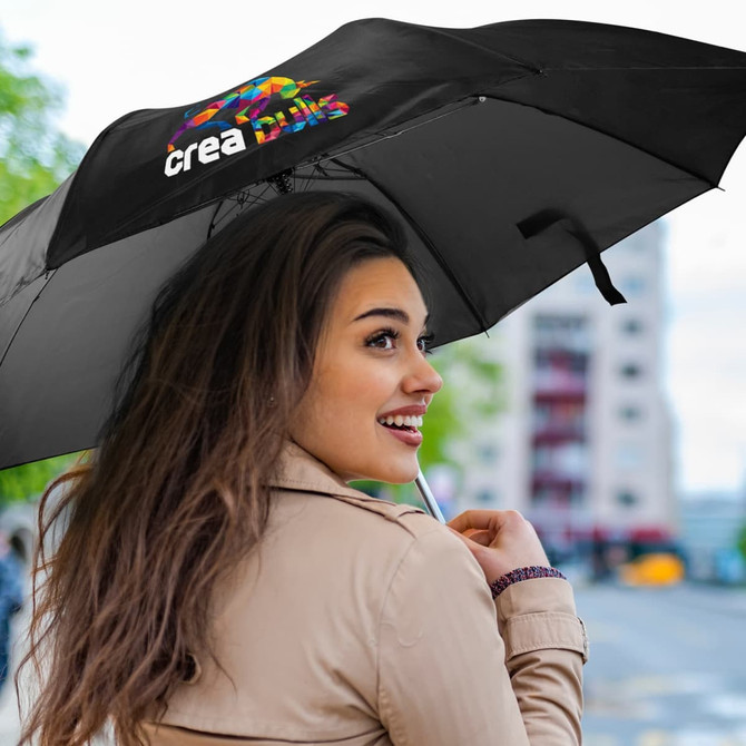 A compact umbrella in black featuring a colorful logo.