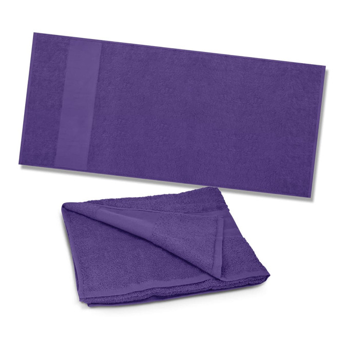 A purple Dune Beach Towel, displaying both a folded and unfolded view, designed for leisure and outdoor use.