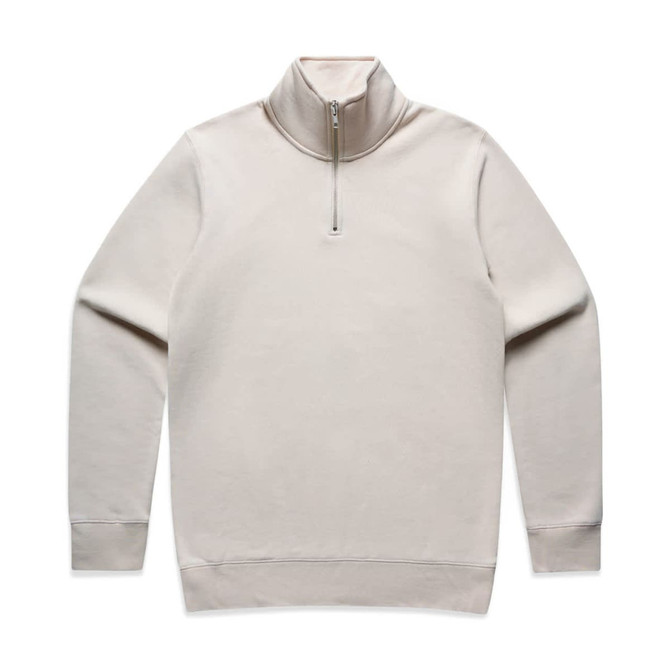 A beige half zip crew jumper with long sleeves and a zipper at the neck. It features a logo on the design.