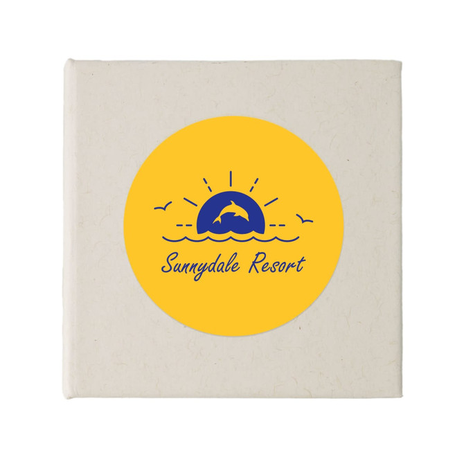 A circular logo featuring a dolphin, sun, and waves, set against a yellow background. The logo includes branding.