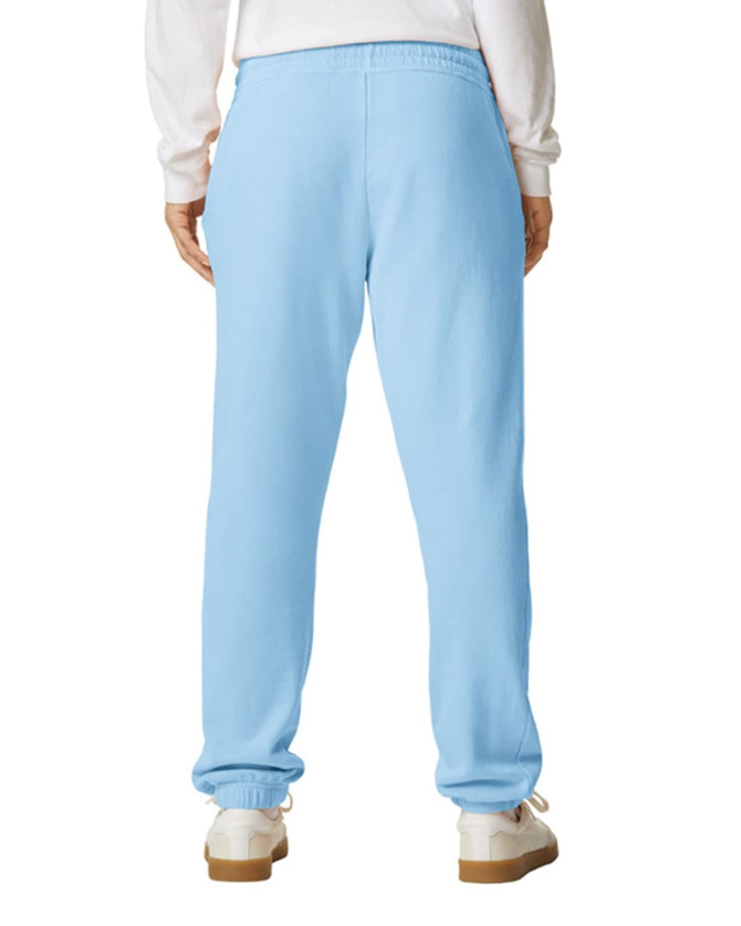 Light blue lightweight sweatpants with elastic waistband and tapered legs, featuring a small logo on the back.