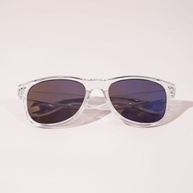 Clear frame sunglasses with dark lenses, featuring a sleek design and subtle branding.