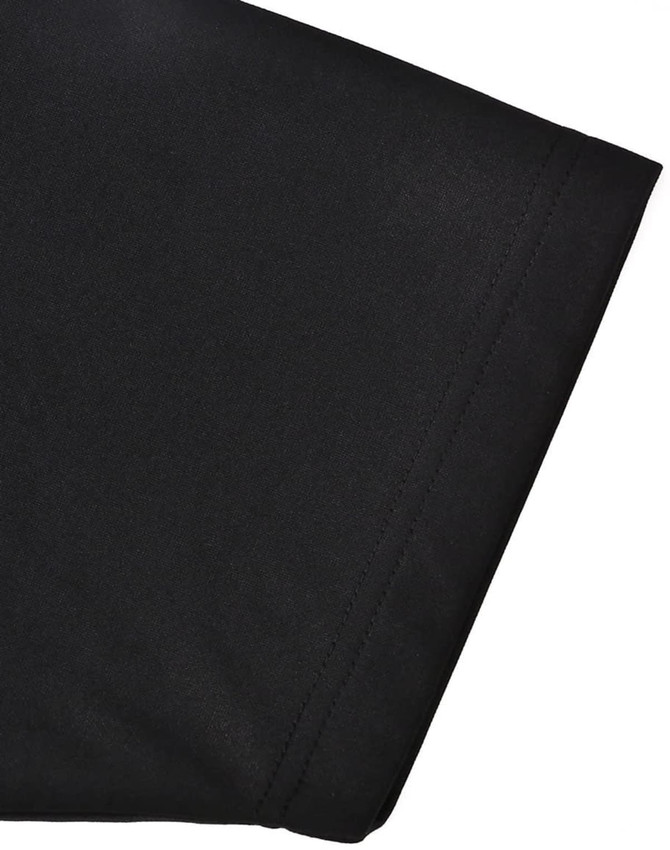 A close-up of a black men's sustainable poly/cotton polo shirt sleeve, featuring a neat seam and soft texture.