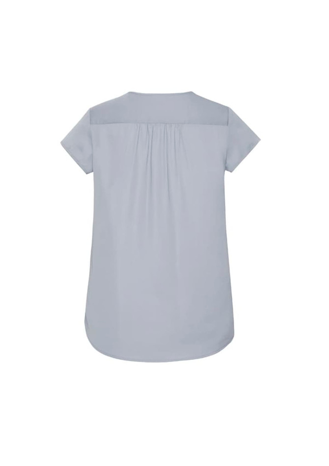 A light blue women's blouse featuring a V-neck and pleat detailing at the back. Includes a logo.
