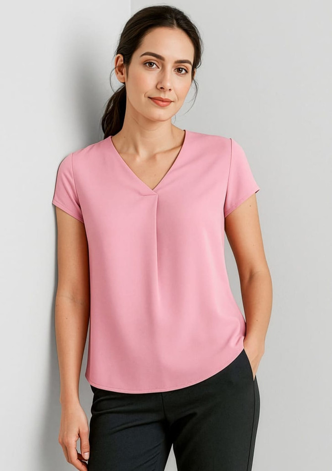 A pink women's V-neck pleat blouse with short sleeves, featuring a relaxed fit and subtle pleat detail.