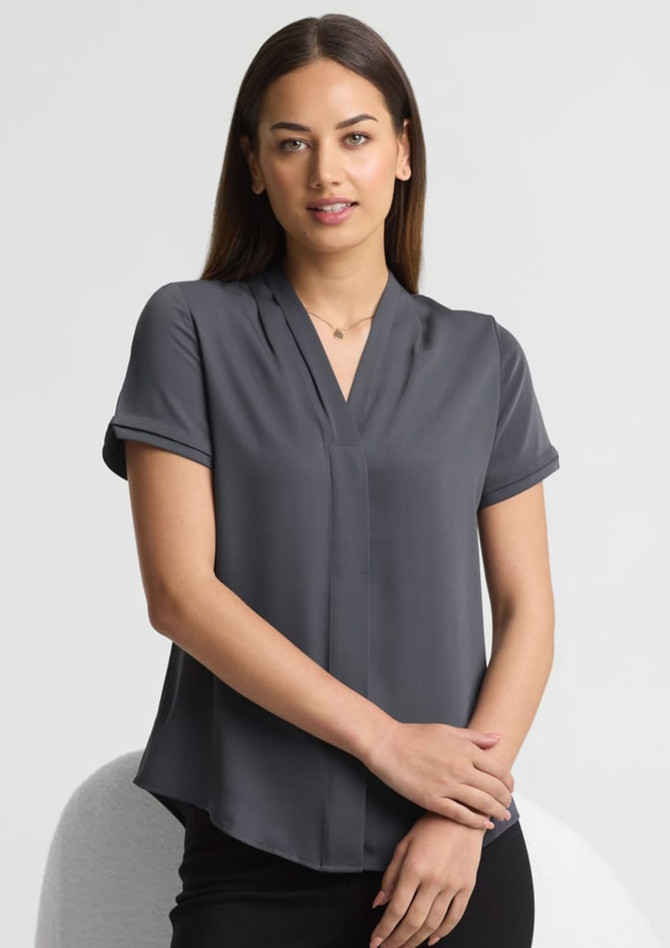 A short sleeve button-up shirt in a dark grey colour, featuring a v-neck design and a subtle logo.