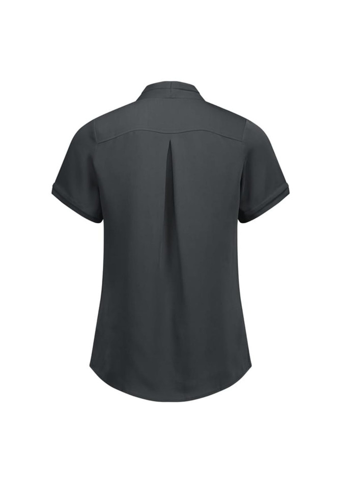 A women's short sleeve button-up shirt in dark grey, featuring a back pleat and rolled cuffs. It has a logo.