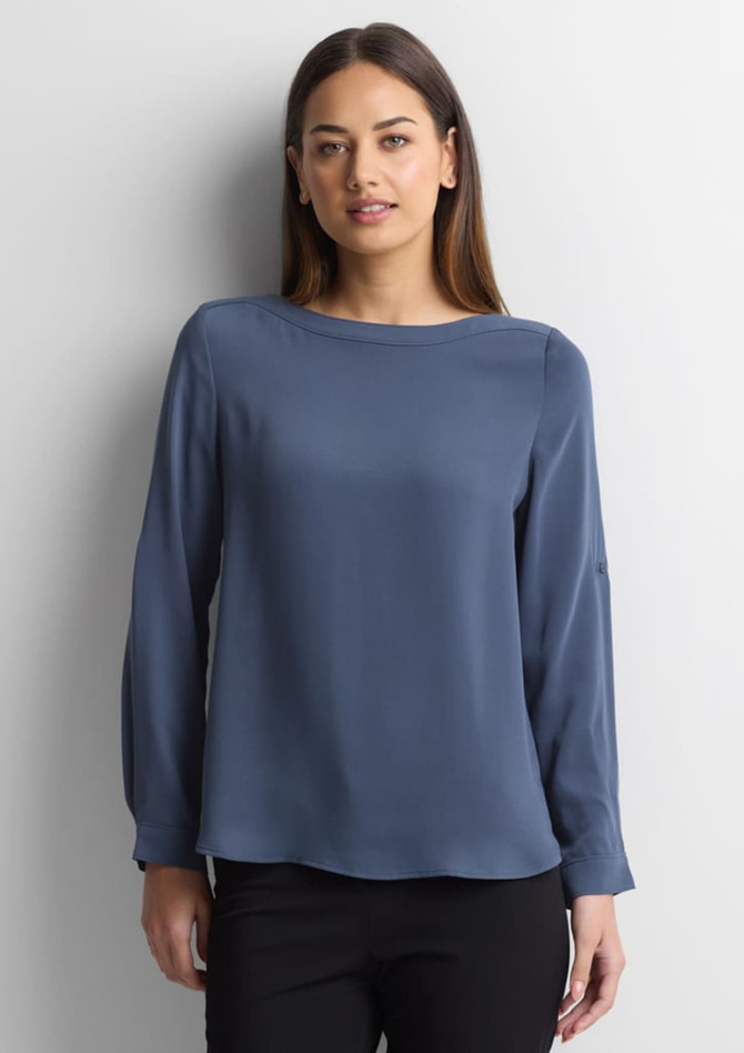 A women's boatneck top in a solid navy blue, featuring long sleeves and a relaxed fit. The image includes a logo.