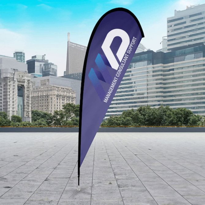 A large tear drop flag kit in purple with a logo, set against a modern cityscape background.