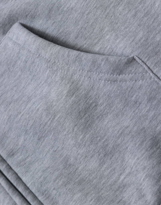 A light grey men's full-zip fleecy hoodie with a front pocket and soft, textured fabric. Features branding.
