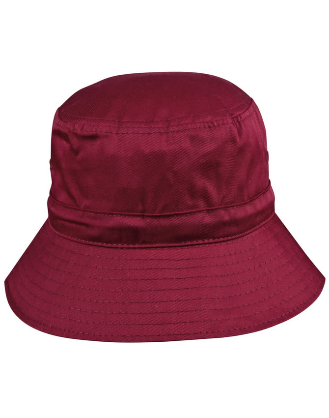 A maroon bucket hat with a wide brim and a toggle fastening, featuring a logo on the side.