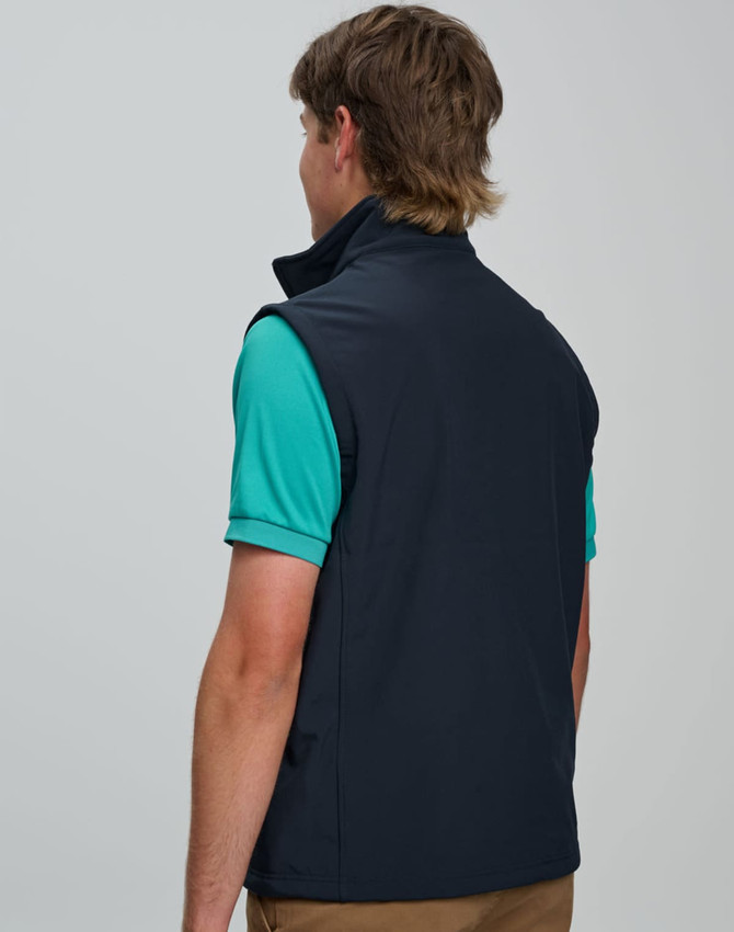 A navy men's softshell vest with a high collar, featuring a logo on the back, displayed on a model.