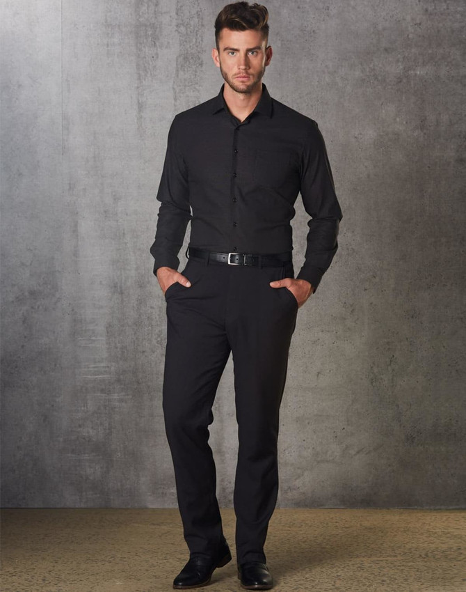 Men's black polyviscose stretch pants, styled with a matching shirt and belt, set against a textured grey background.