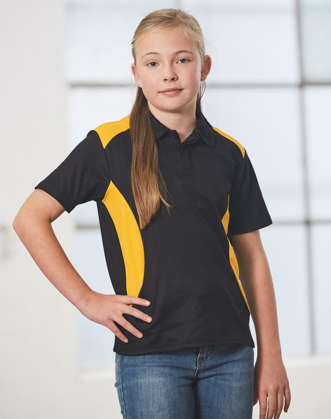 A black and yellow polo shirt featuring a branding logo, worn by a girl with long hair and standing confidently.