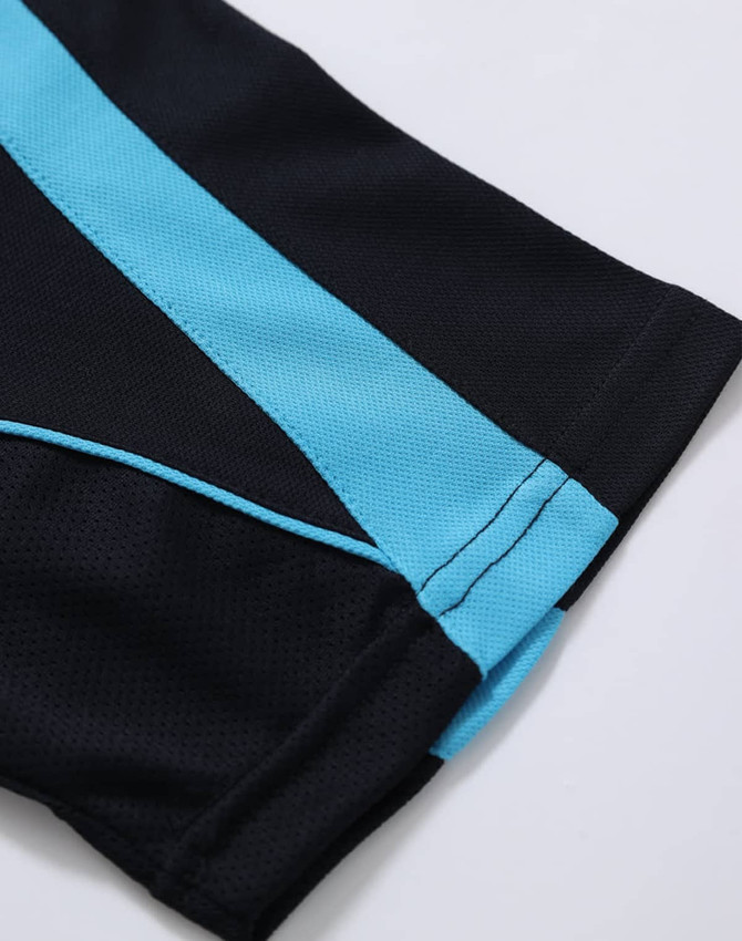 A close-up of a black polo shirt featuring blue stripes and a logo.