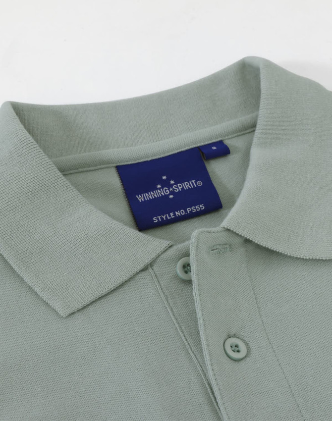 A mint green men's cotton stretch polo shirt featuring a collar and buttons, with a branding label inside.