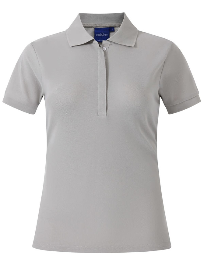 A light beige ladies' polo shirt with a collar and short sleeves, featuring a small logo.