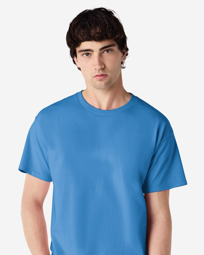 A blue Gildan Ultra Cotton adult T-shirt with short sleeves and a crew neck, featuring a branding logo.