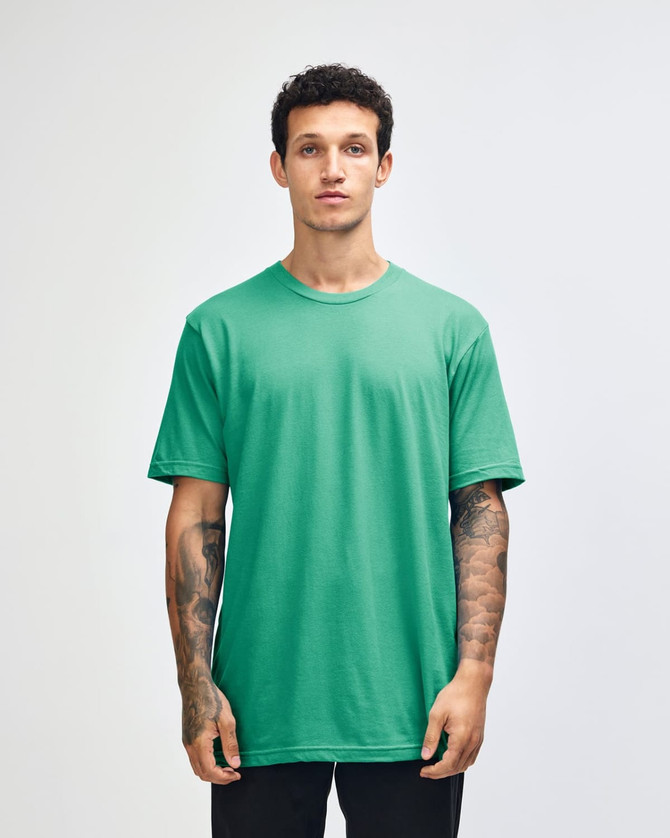 A light turquoise unisex short sleeve t-shirt worn by a model, featuring a logo.
