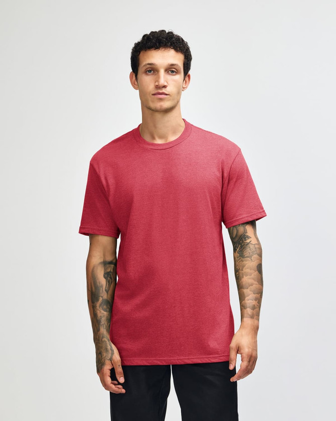 A unisex CVC short sleeve t-shirt in a burgundy colour, featuring a model wearing it and a plain design.
