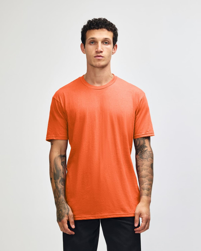 An unisex short sleeve T-shirt in vibrant orange, featuring a simple design and crew neck. It has a logo.