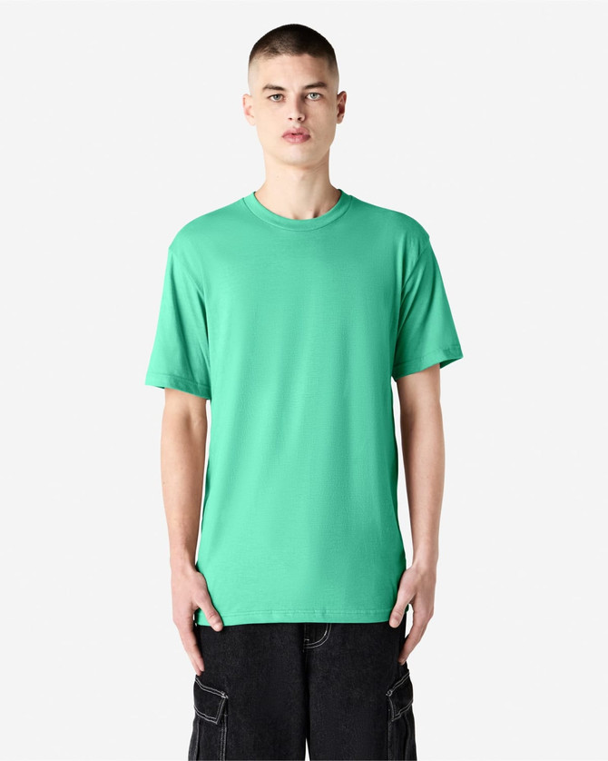 A solid mint green unisex short sleeve T-shirt on a model, featuring a logo on the chest.