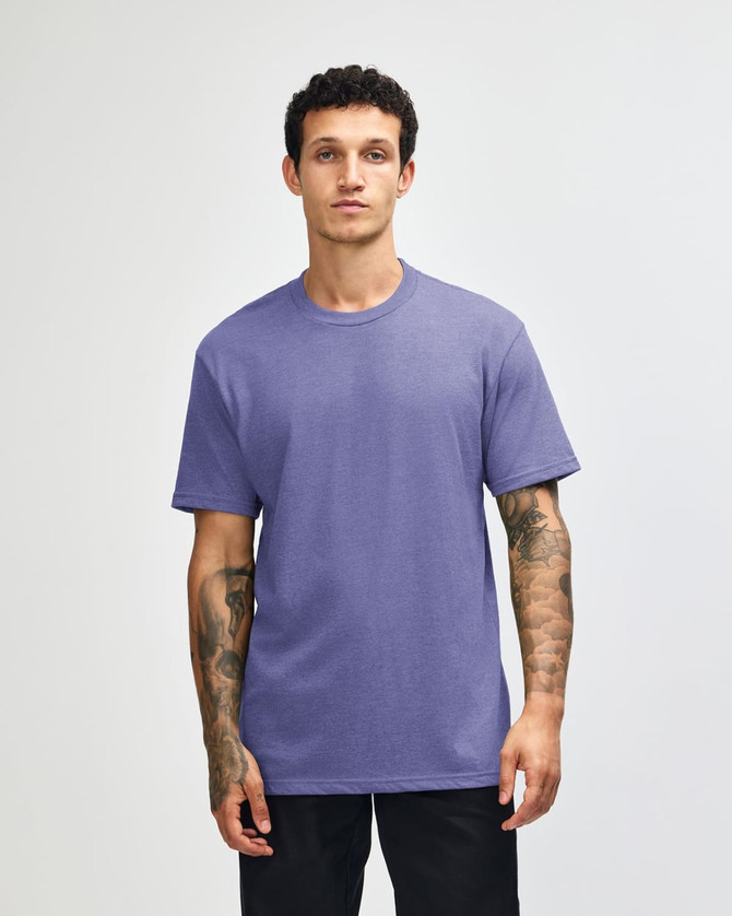 A unisex short sleeve T-shirt in a vibrant purple colour, featuring a simple design and a logo.