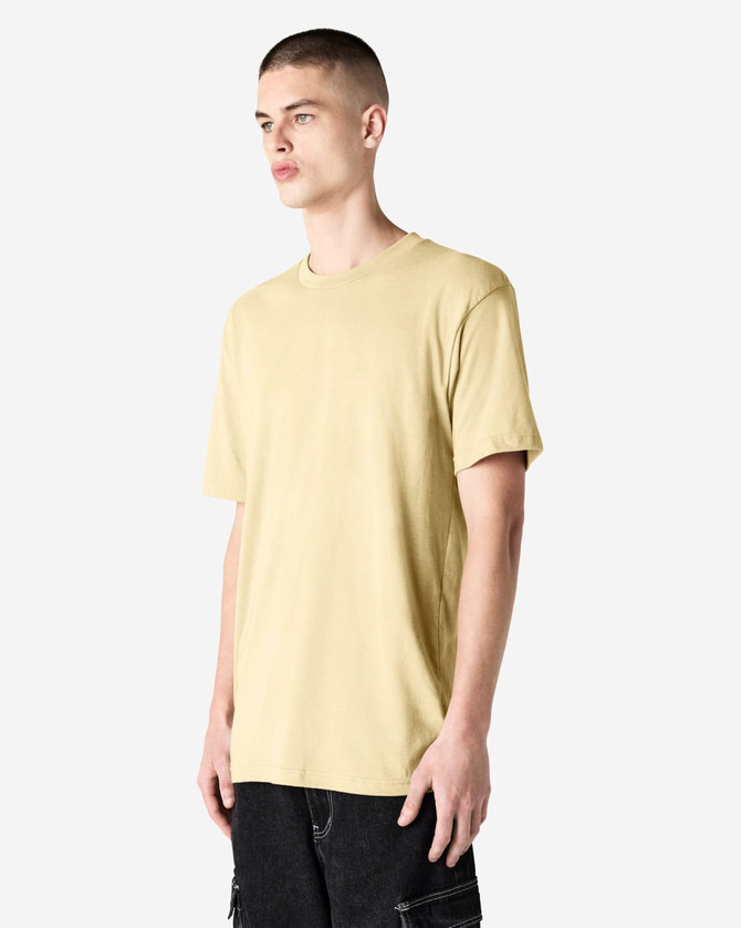A unisex short sleeve t-shirt in a soft yellow colour, featuring a relaxed fit and a logo.
