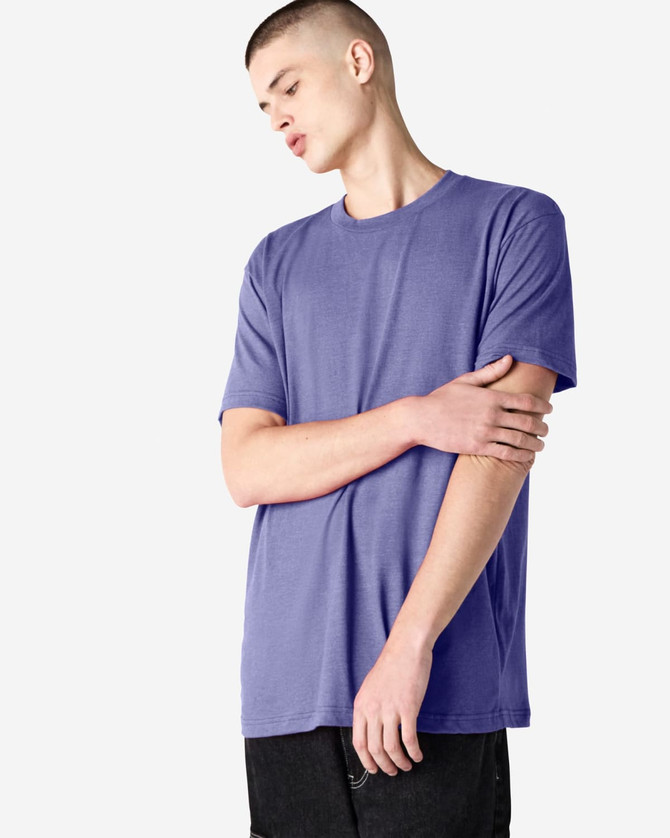 A unisex short sleeve T-shirt in a purple shade, featuring a subtle logo on the front.