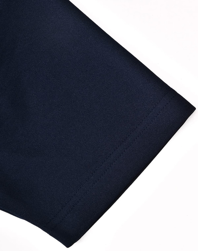 A dark navy blue polo shirt with a short sleeve, featuring a contrasting design and a logo.