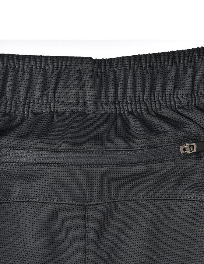 Bamboo charcoal sports shorts in black with a textured fabric and an elastic waistband featuring a zippered pocket.