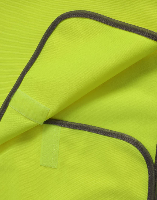 A vibrant yellow kid's safety vest with contrasting trim and a velcro fastening. It features a logo.