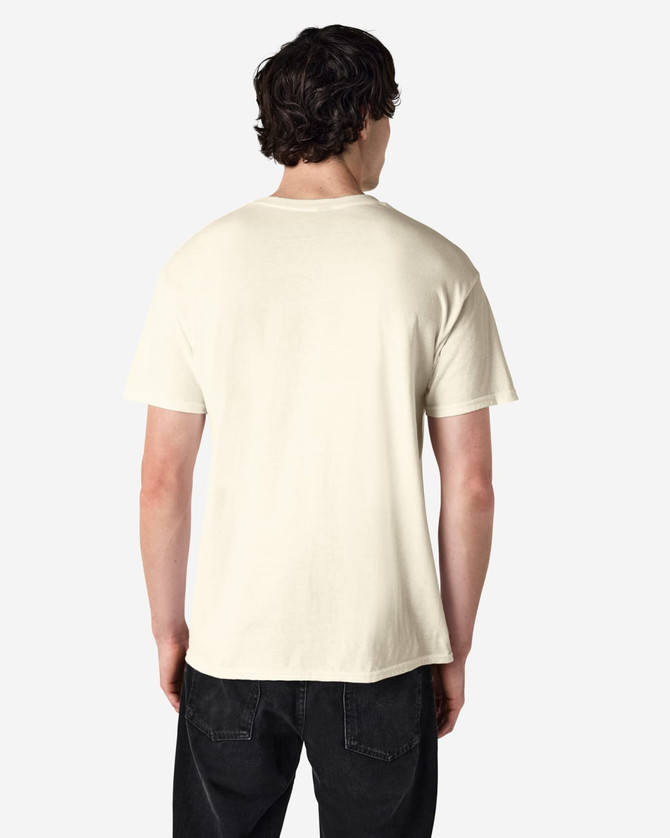 A plain cream adult t-shirt is displayed from the back, showcasing its simple design and fabric texture.