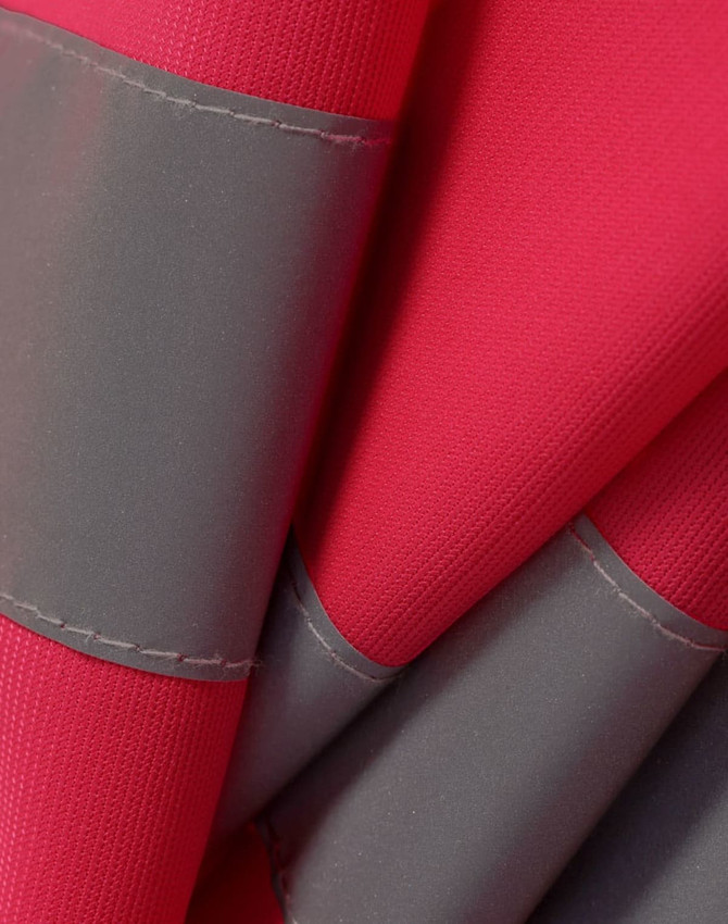 A hi-vis safety vest in bright red with grey shoulder reflective tapes, featuring a textured fabric.