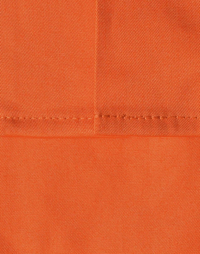 An orange fabric swatch featuring a close-up of stitching details, ideal for workwear applications.