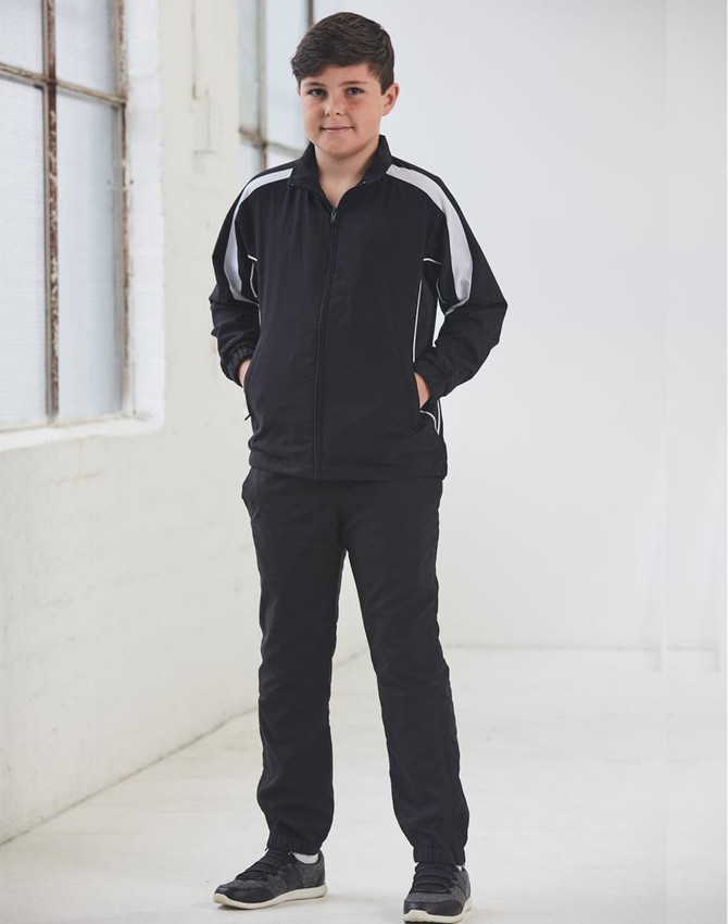 Black track pants designed for kids, featuring white accent stripes and a comfortable fit.