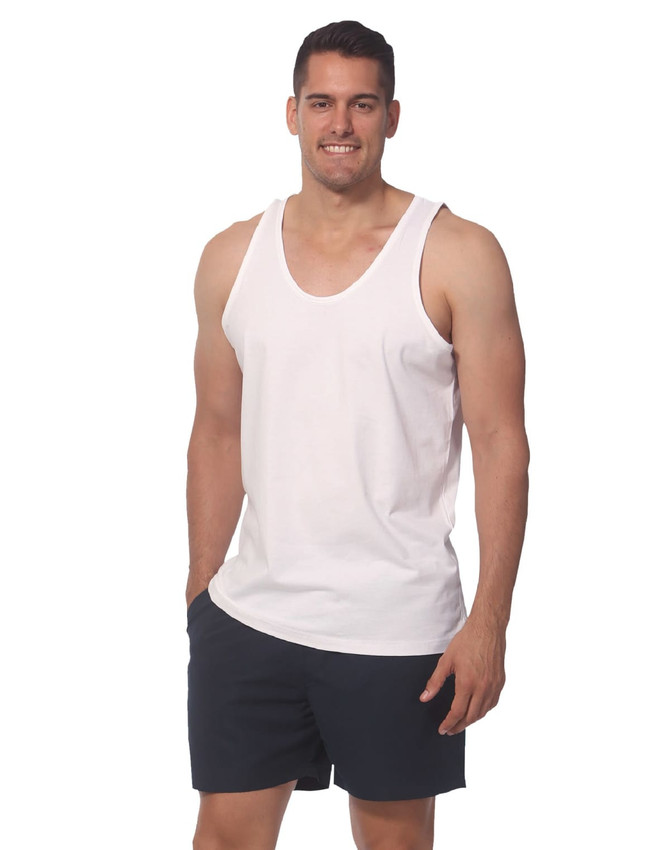 A men's cotton singlet in white, featuring a relaxed fit and accompanied by black shorts. It has a logo on the garment.