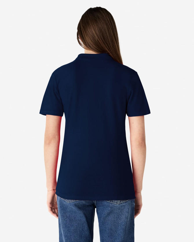 A back view of a navy and red Gildan Softstyle Ladies' Double Pique Polo with a logo.