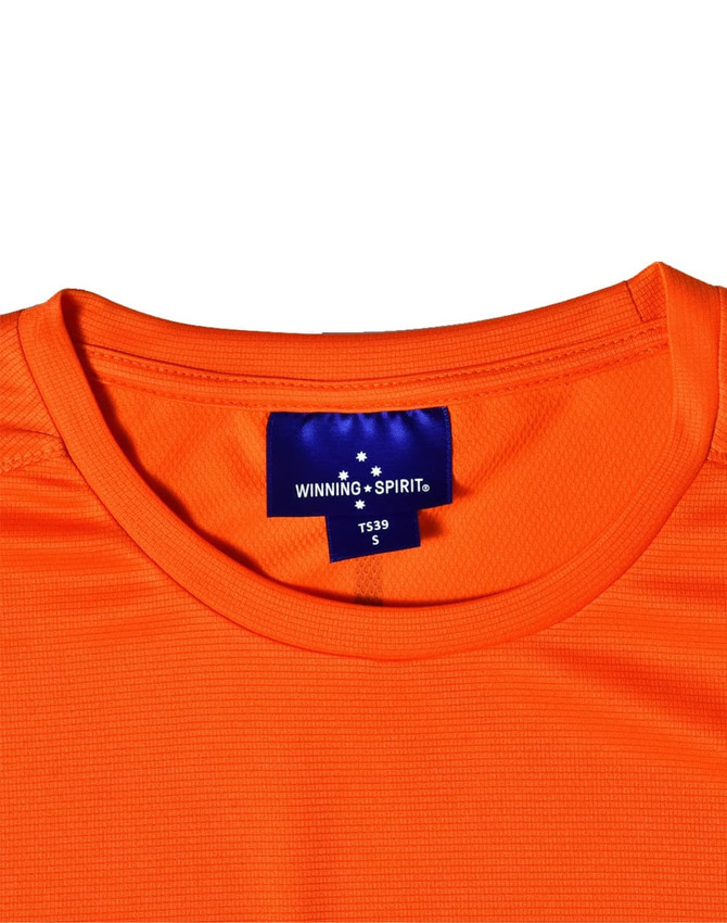 An orange short-sleeve performance tee with a neckline label and a logo.