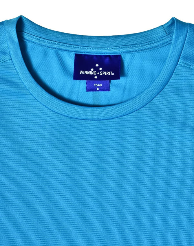A light blue performance T-shirt with a crew neck and a logo on the label. The fabric appears breathable and smooth.