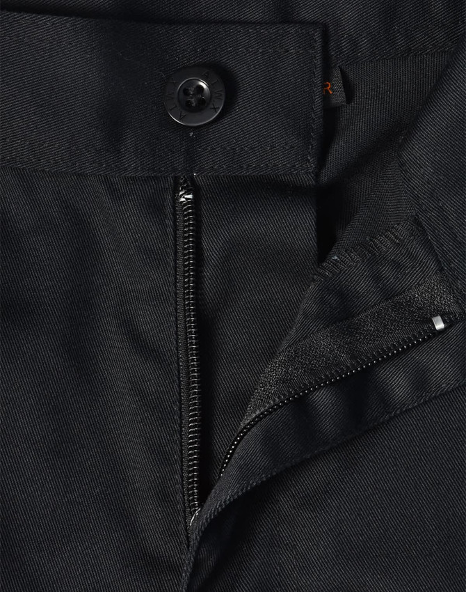 A close-up of black unisex utility stretch cargo work pants, featuring a button and zip closure.