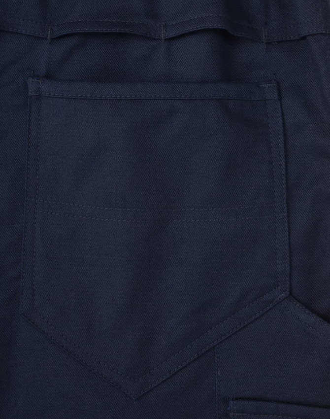 A close-up of navy pants featuring a segmented design and a rear pocket. The fabric has a ripstop texture.