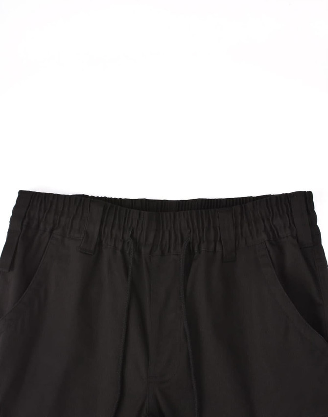 Black unisex cotton stretch drill cuffed work pants featuring an elastic waistband and pockets.