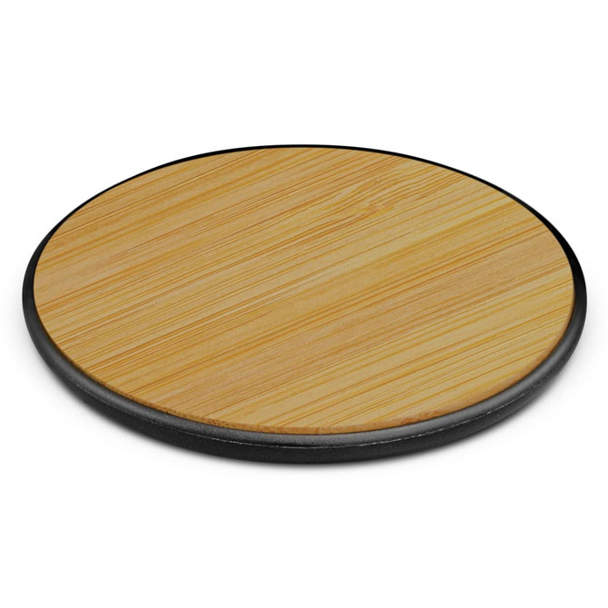 A bamboo wireless charger with a circular design and a black base, featuring a smooth wooden surface.