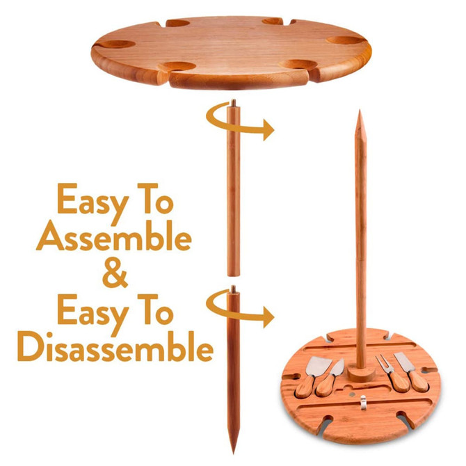 A round wooden outdoor party table in natural wood tones, featuring a detachable base and tools stored underneath.