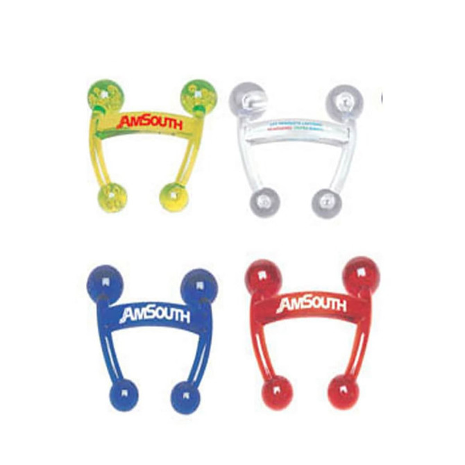A set of four massagers in yellow, clear, blue, and red, each featuring a logo.