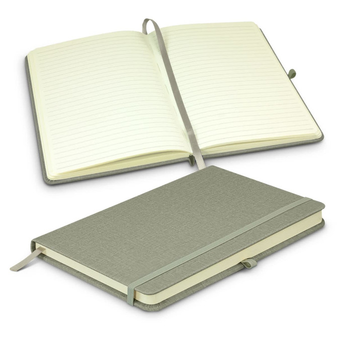 A green notebook with lined pages, featuring a ribbon bookmark and an elastic band closure.