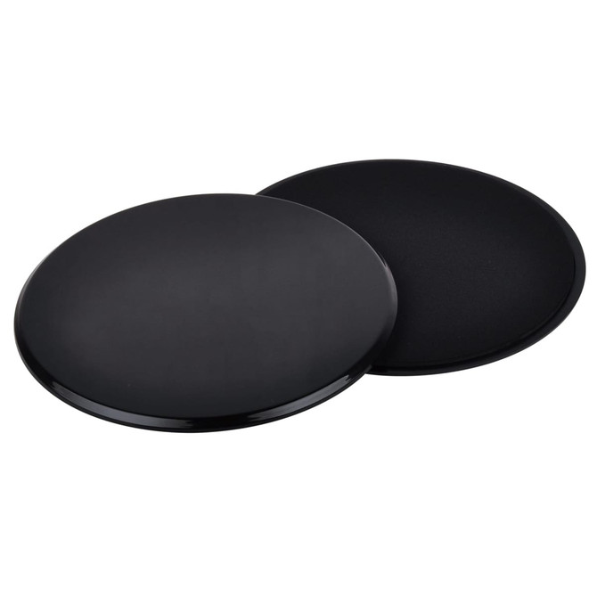 A black non-slip yoga mat with a smooth surface. It has a round shape and a subtle texture on one side.