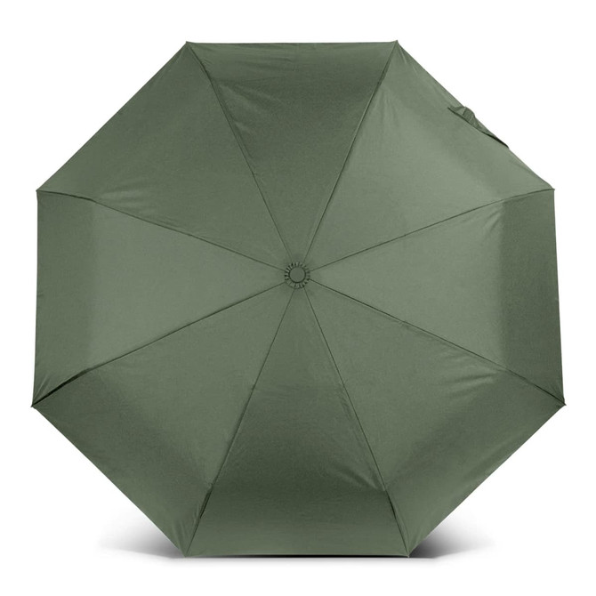 A compact umbrella in a muted green colour with a circular design and a central button mechanism.